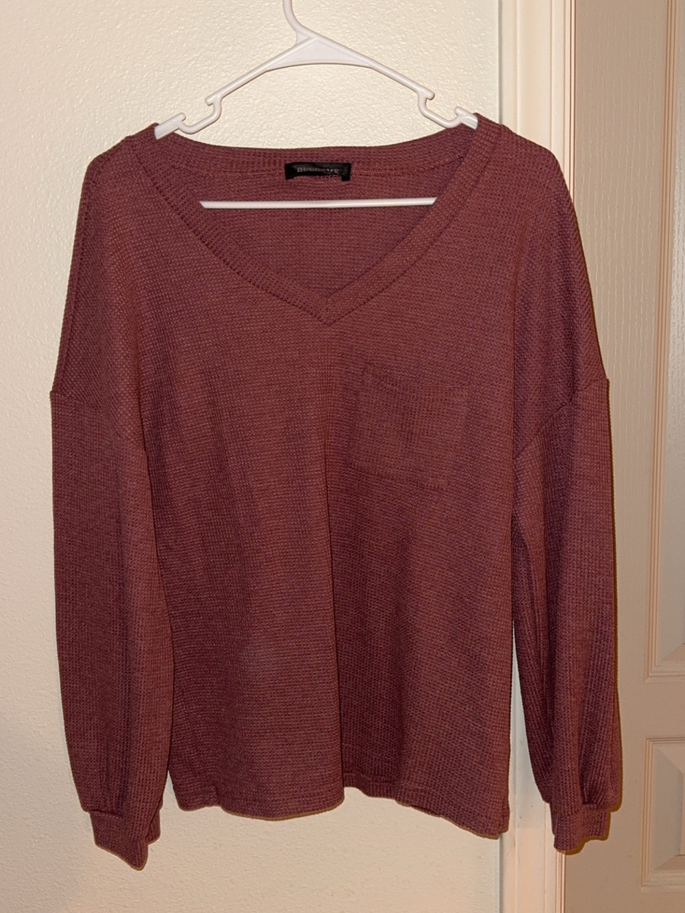 Relaxed V‑Neck Pocket Sweater in Mauve